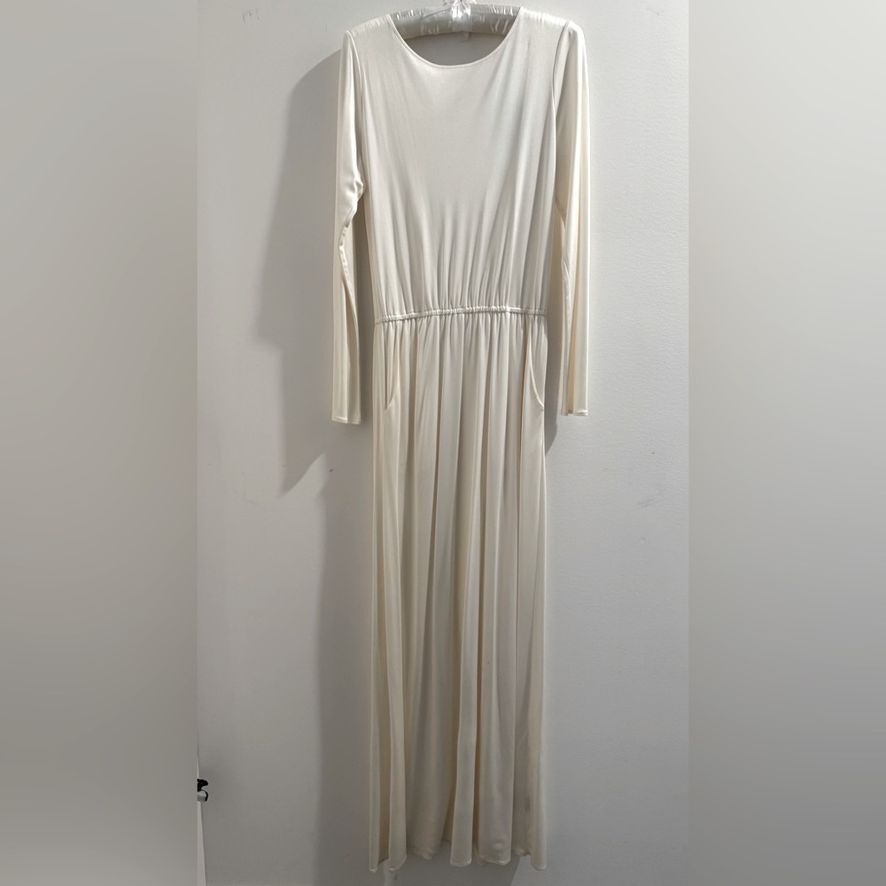 White silk backless gown with cinched waste